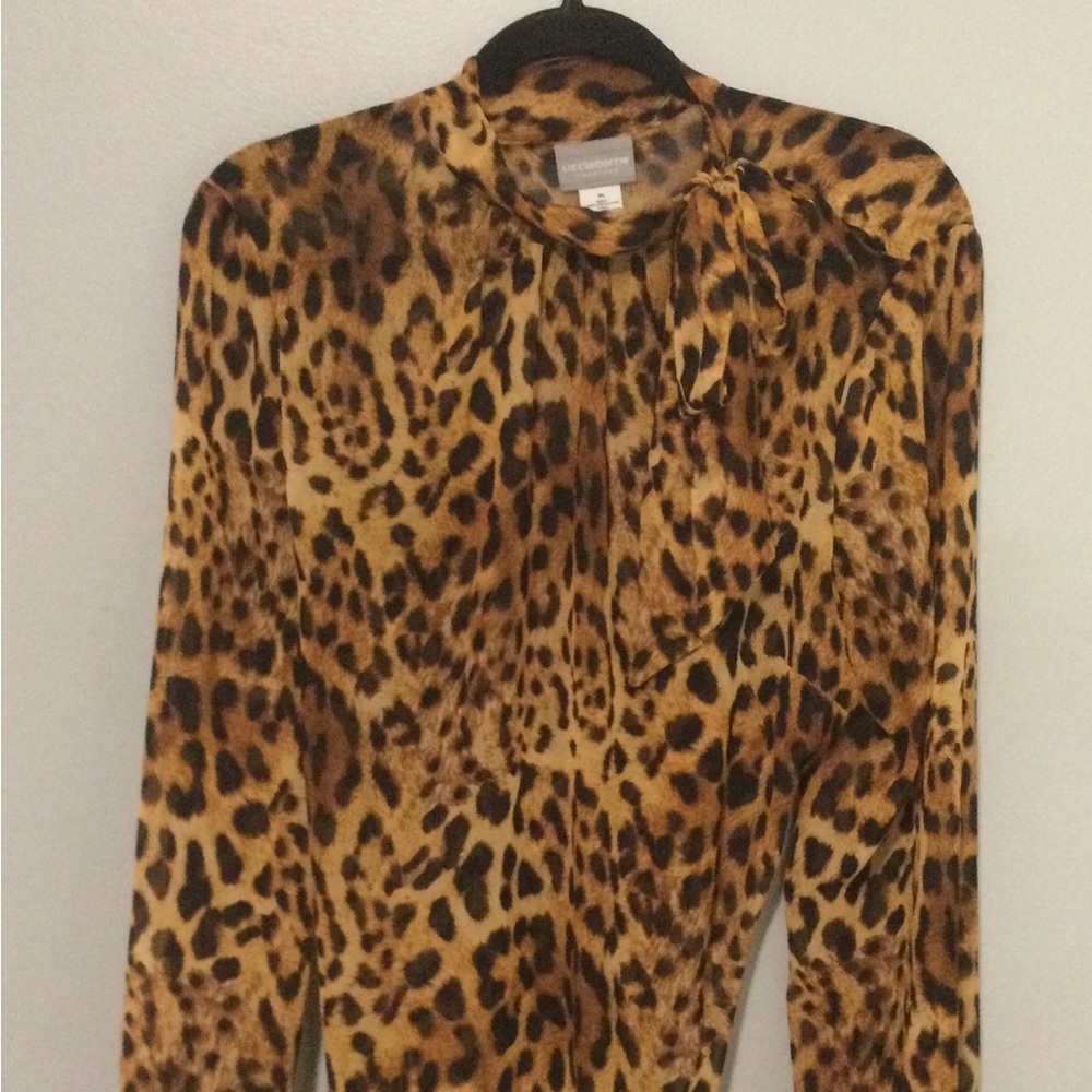 SOLD- Leopard print sheer blouse. Never worn, just hanging in the closet.